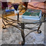 F19. Glass top coffee table.